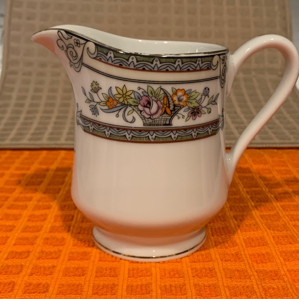 Small creamer with flowers